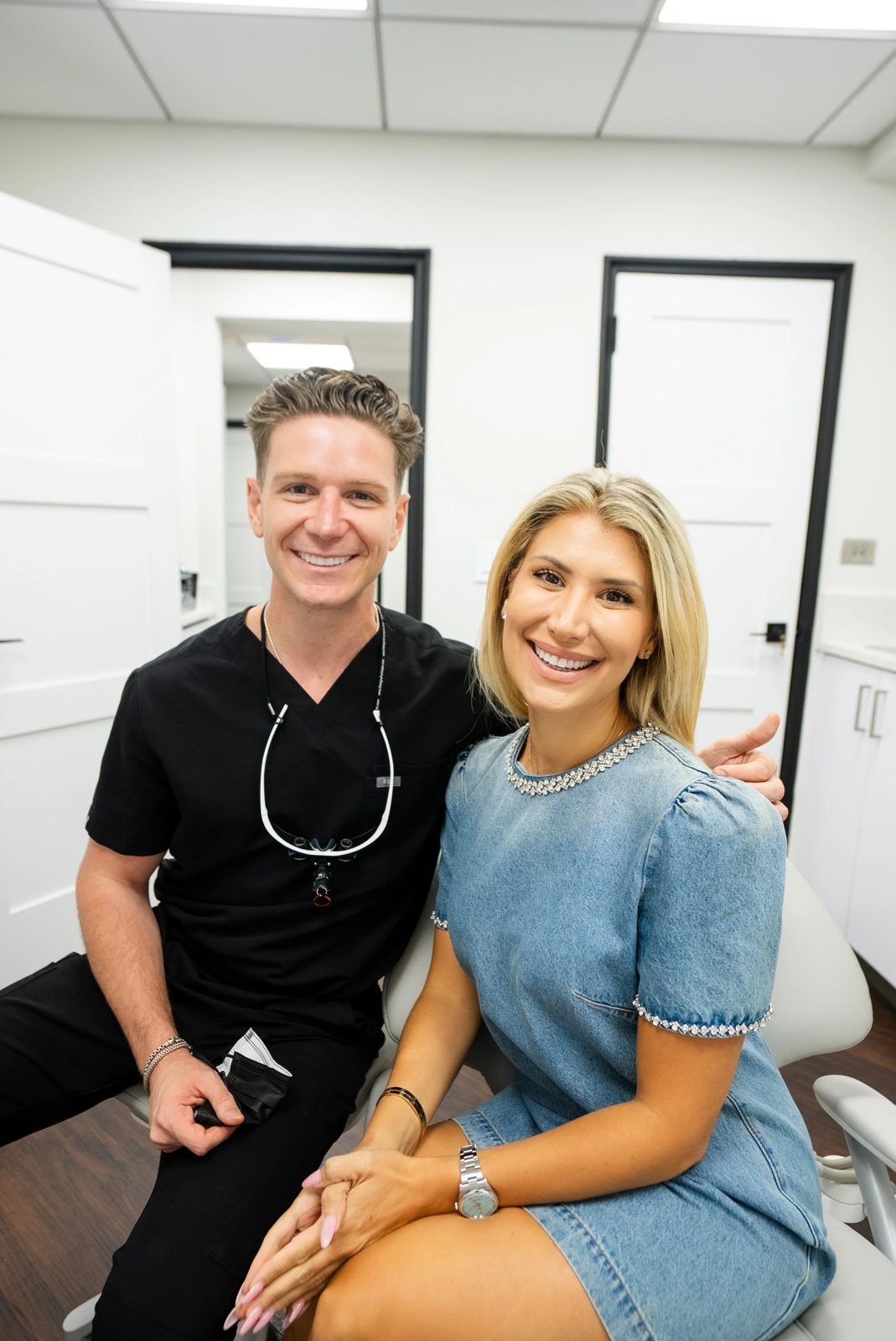 Dr. Gaspari with a smiling patient in the treatment chair